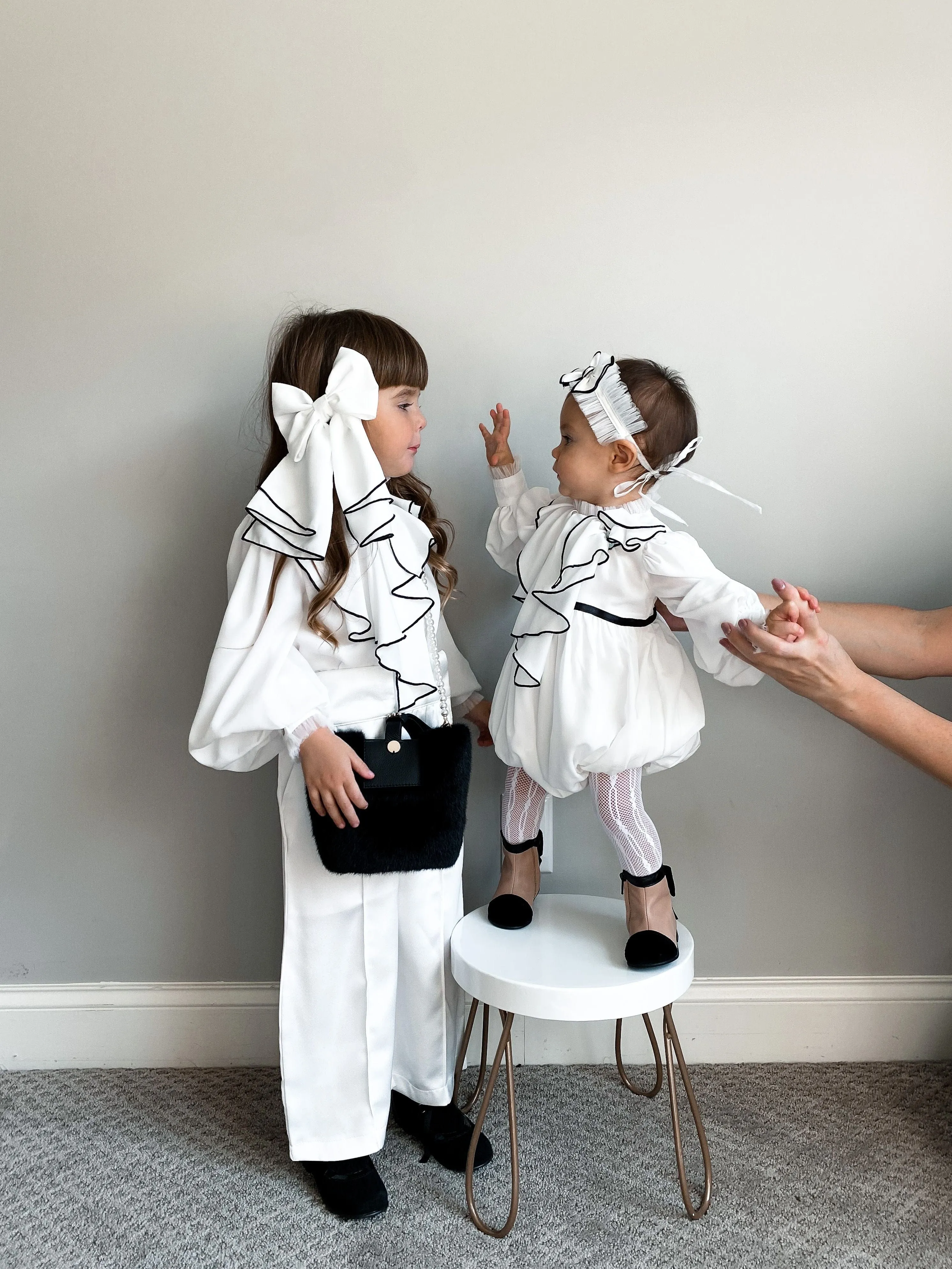 Gwen White Romper with Black Ruffle Trim