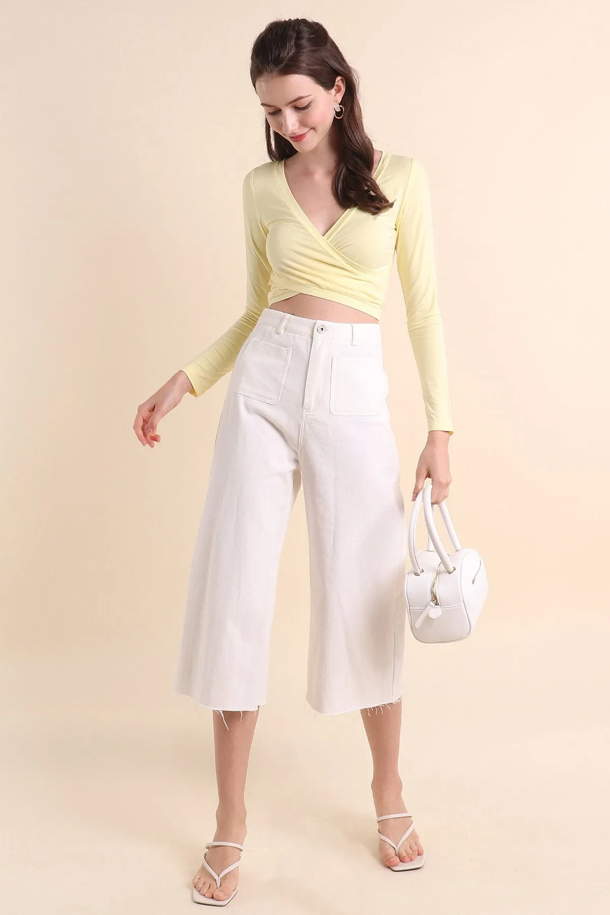 MADEBYNM BASICS EVIE V-NECK LONG SLEEVE CROPPED TOP IN PALE DAFFODIL